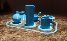 Klasa 7 i 8. Chemia i informatyka. Chemiczne pionki i kostka do gry – druk 3D